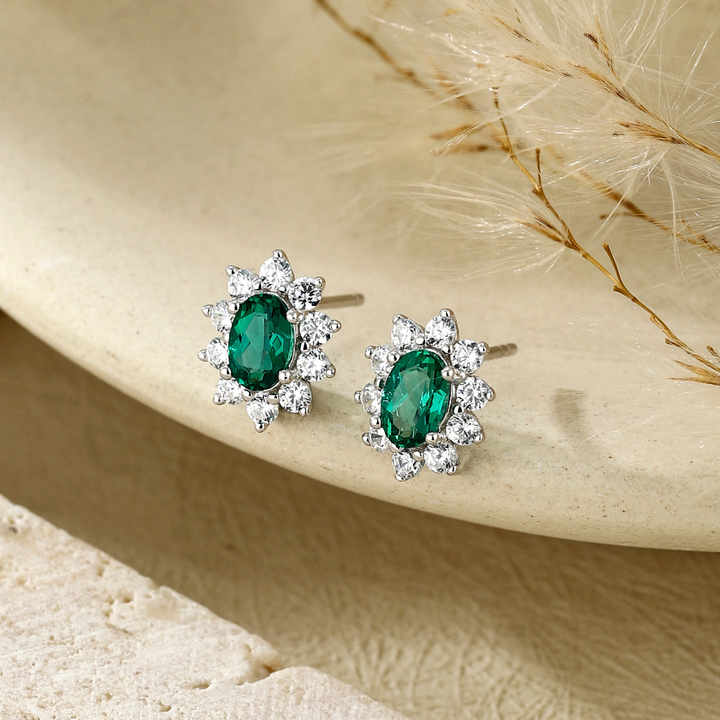 Oval Cut Emerald Floral Studs