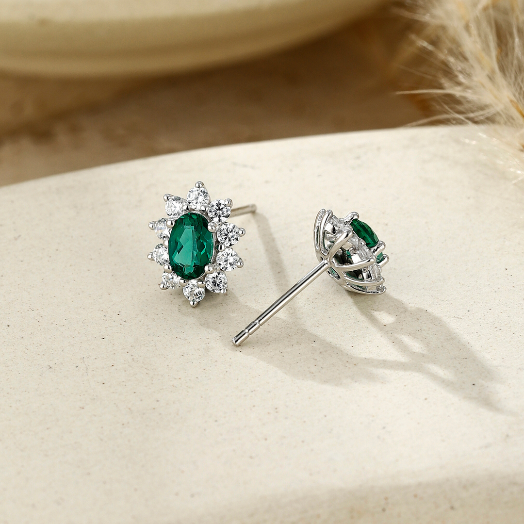Oval Cut Emerald Floral Studs
